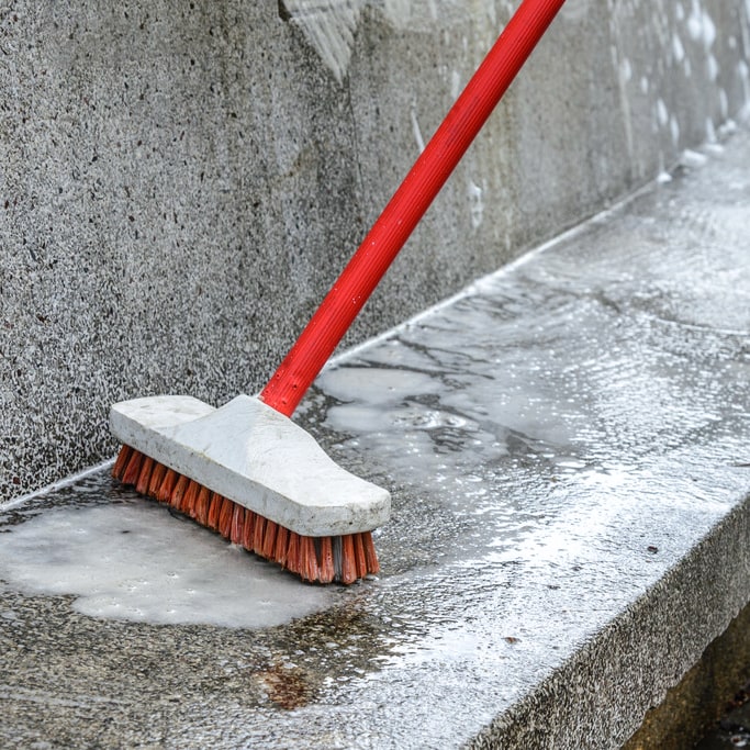Stock Photo Outdoor Cleaning With Red Brush