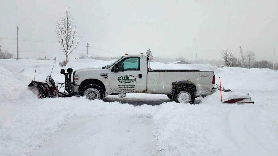 Cox Truck Plowing Snow